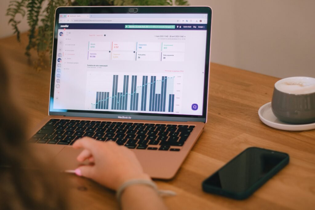 A small business owner viewing SEO data on a laptop